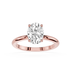 Rose gold ring with a large diamond on a white background