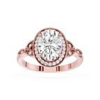 Rose gold ring with a large diamond and smaller diamonds on the band against a white background