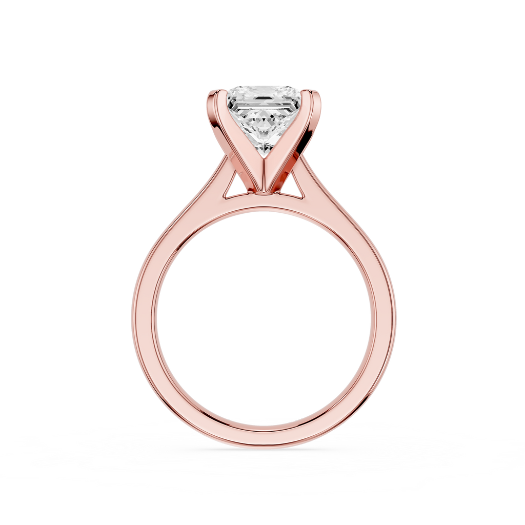Rose gold ring with a diamond on a white background