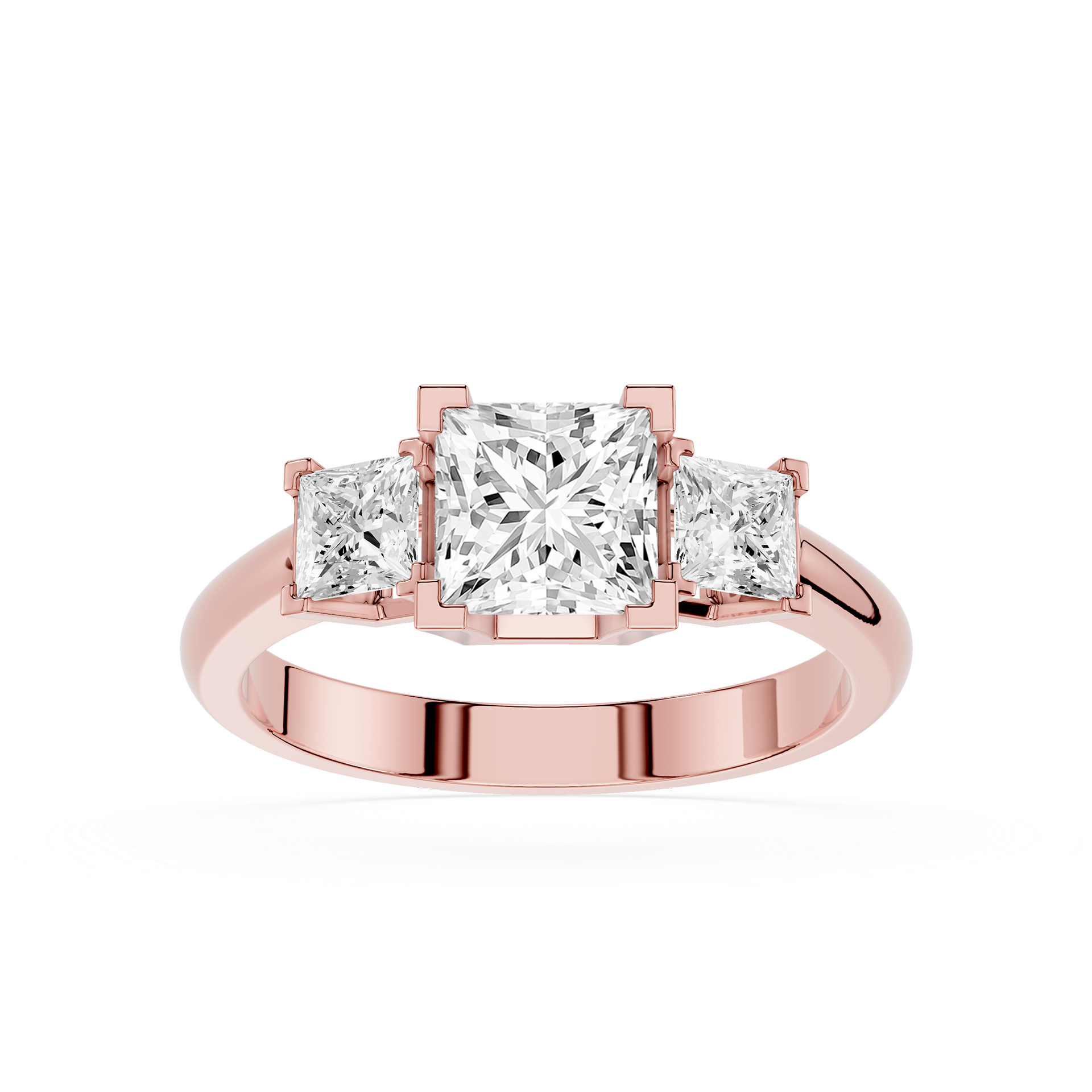 Rose gold ring with three princess-cut diamonds on a white background