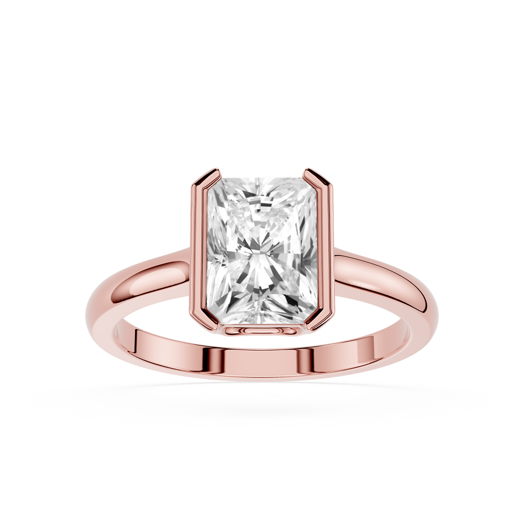 Rose gold ring with a large diamond on a white background
