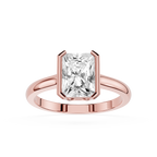 Rose gold ring with a large diamond on a white background