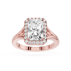 Rose gold ring with a large diamond and smaller diamonds around on a white background