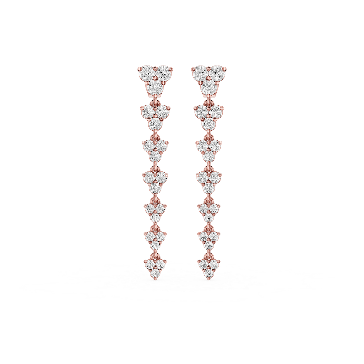 Rose gold and diamond earrings on a white background