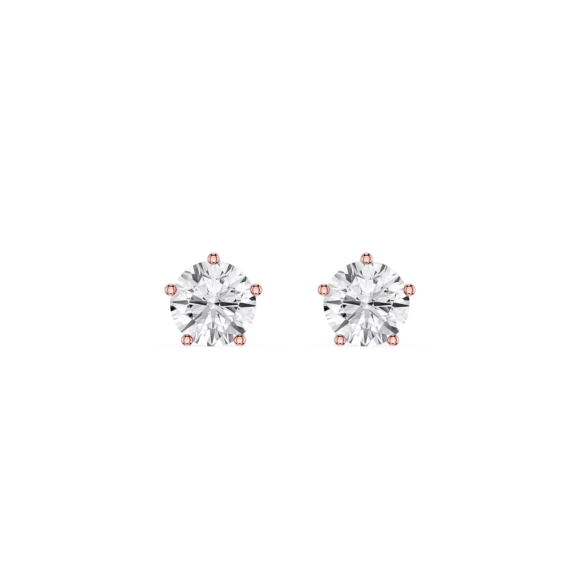 Pair of diamond stud earrings on a white background