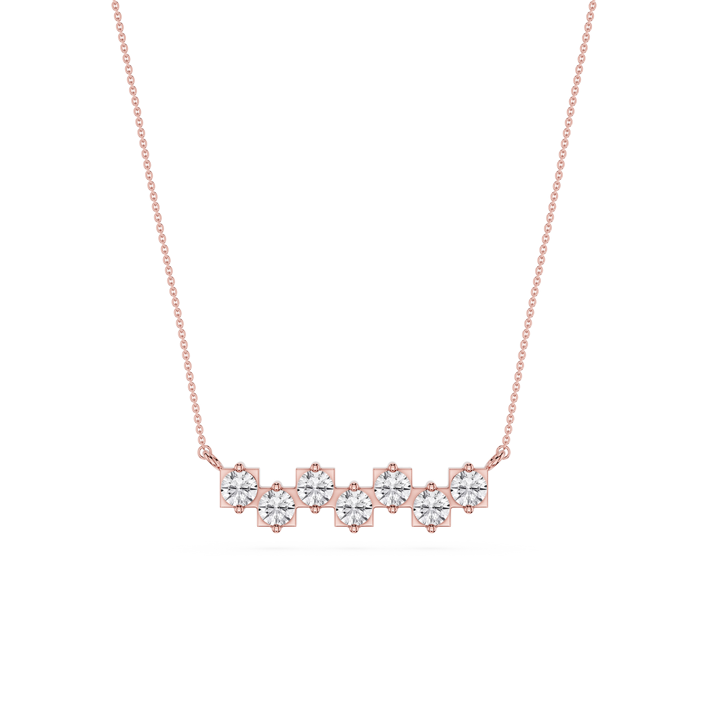 Rose gold necklace with diamond accents on a white background