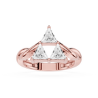 Rose gold ring with triangular diamond design on a white background