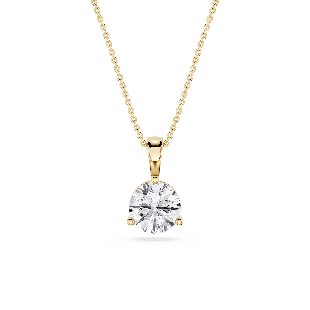 Gold necklace with a round diamond pendant on a white background