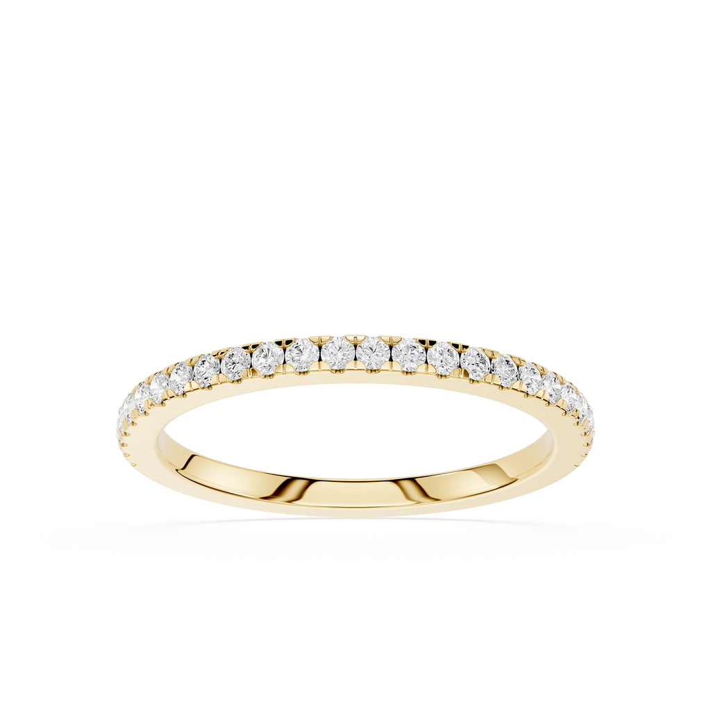 Gold ring with small diamonds on a white background