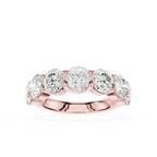 A rose gold five-stone diamond band ring with five round-cut diamonds set in a polished rose gold band, shown on a clean white background.
