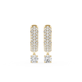 Pair of gold and diamond earrings on a white background