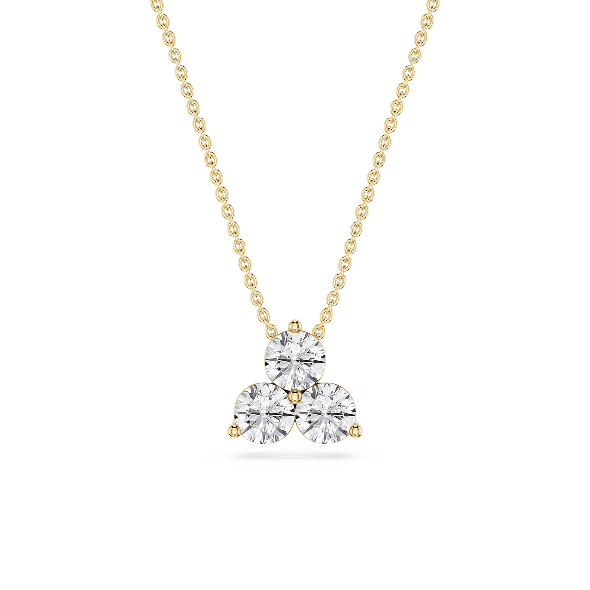 Gold necklace with a heart-shaped diamond pendant on a white background