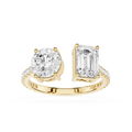 A white gold or platinum split-shank ring featuring a round brilliant-cut diamond on one side and an emerald-cut diamond on the other, set against a plain white background.