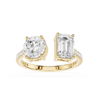 A white gold or platinum split-shank ring featuring a round brilliant-cut diamond on one side and an emerald-cut diamond on the other, set against a plain white background.