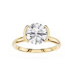 Gold ring with a diamond on a white background