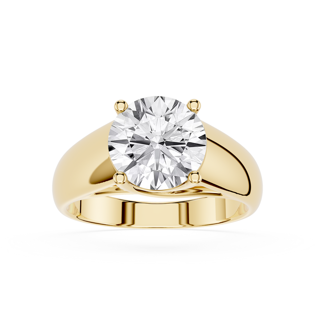 Gold ring with a large diamond on a white background