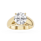 Gold ring with a large diamond on a white background
