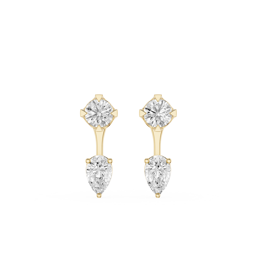 Pair of gold earrings with clear gemstones on a white background