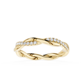 Gold ring with diamond accents on a white background