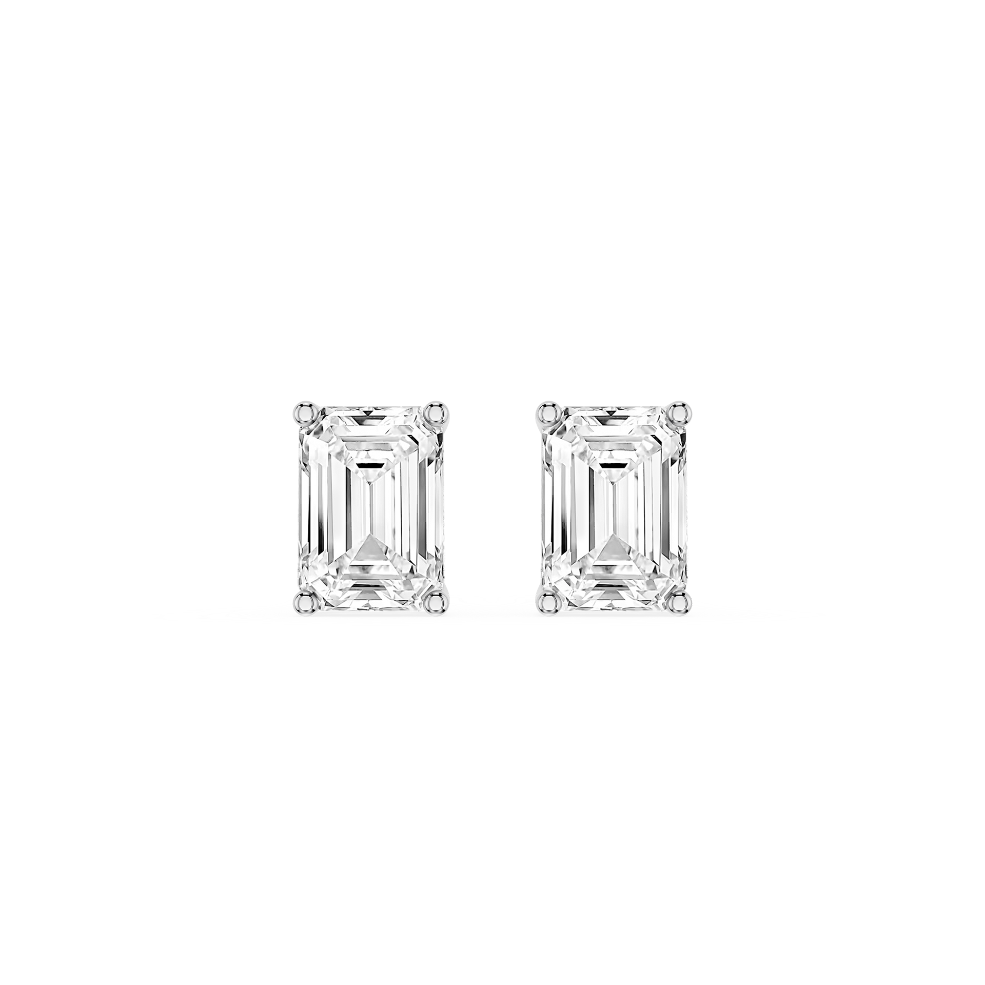 Pair of emerald-cut diamond stud earrings on a white background