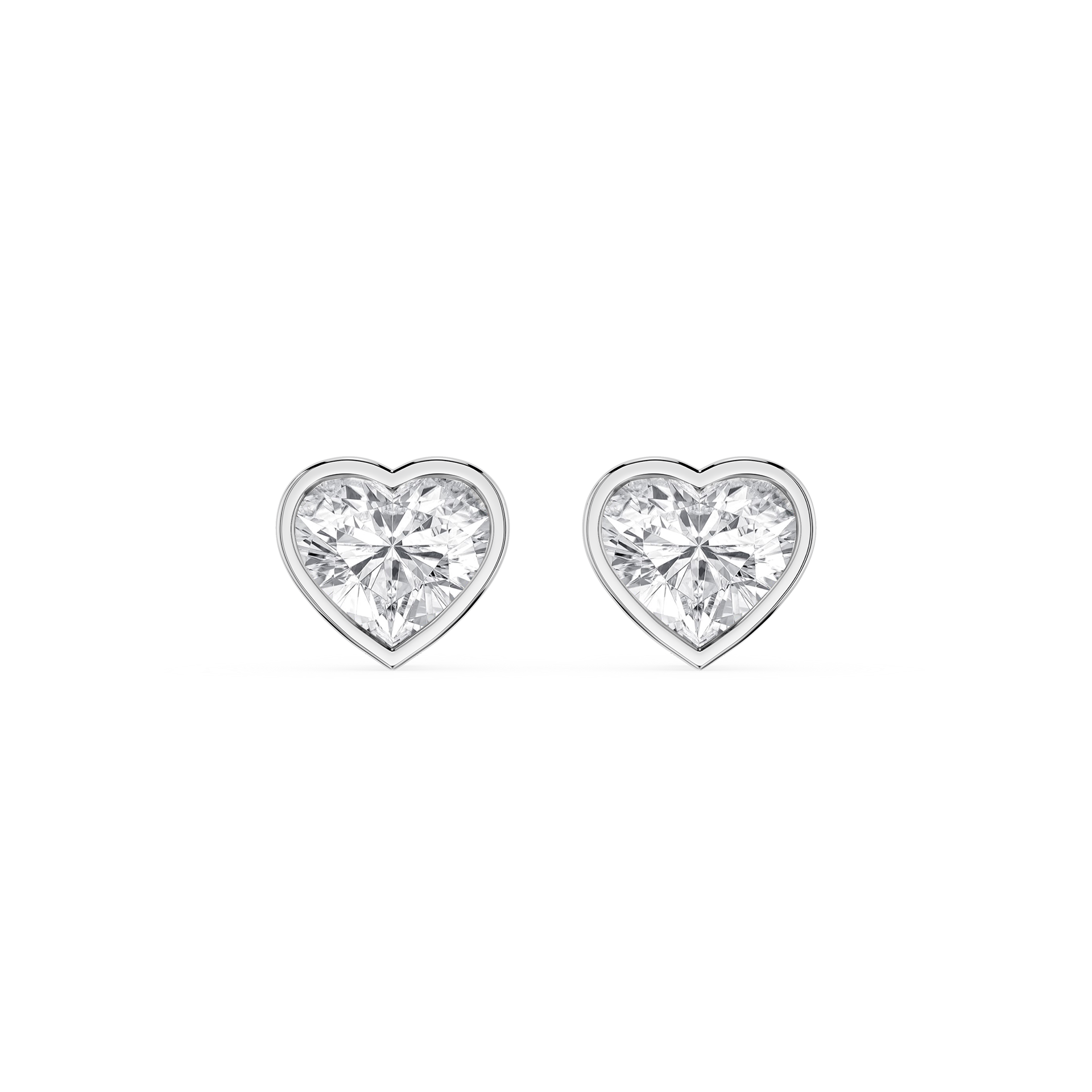 Heart-shaped diamond earrings on a white background
