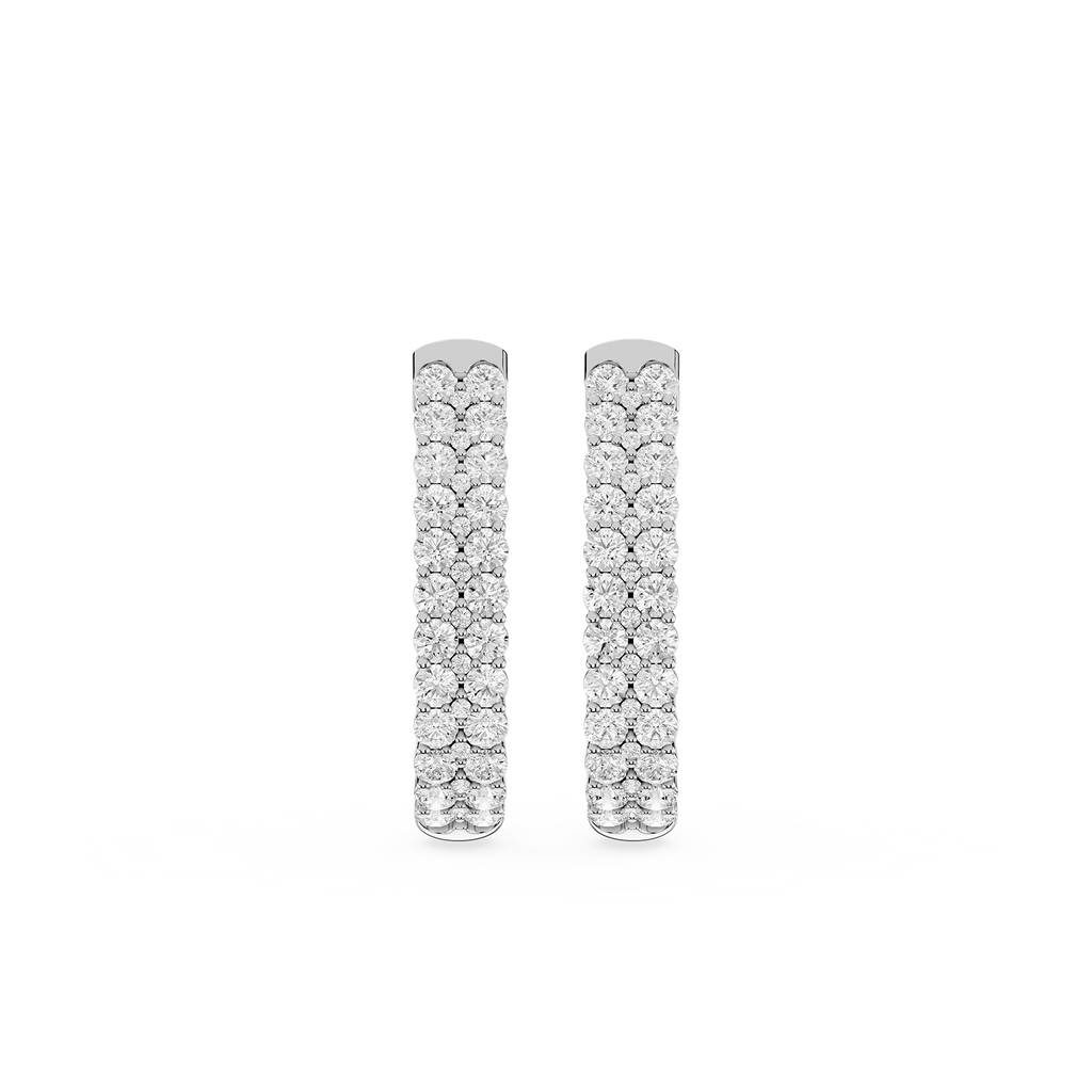 Pair of diamond earrings on a white background