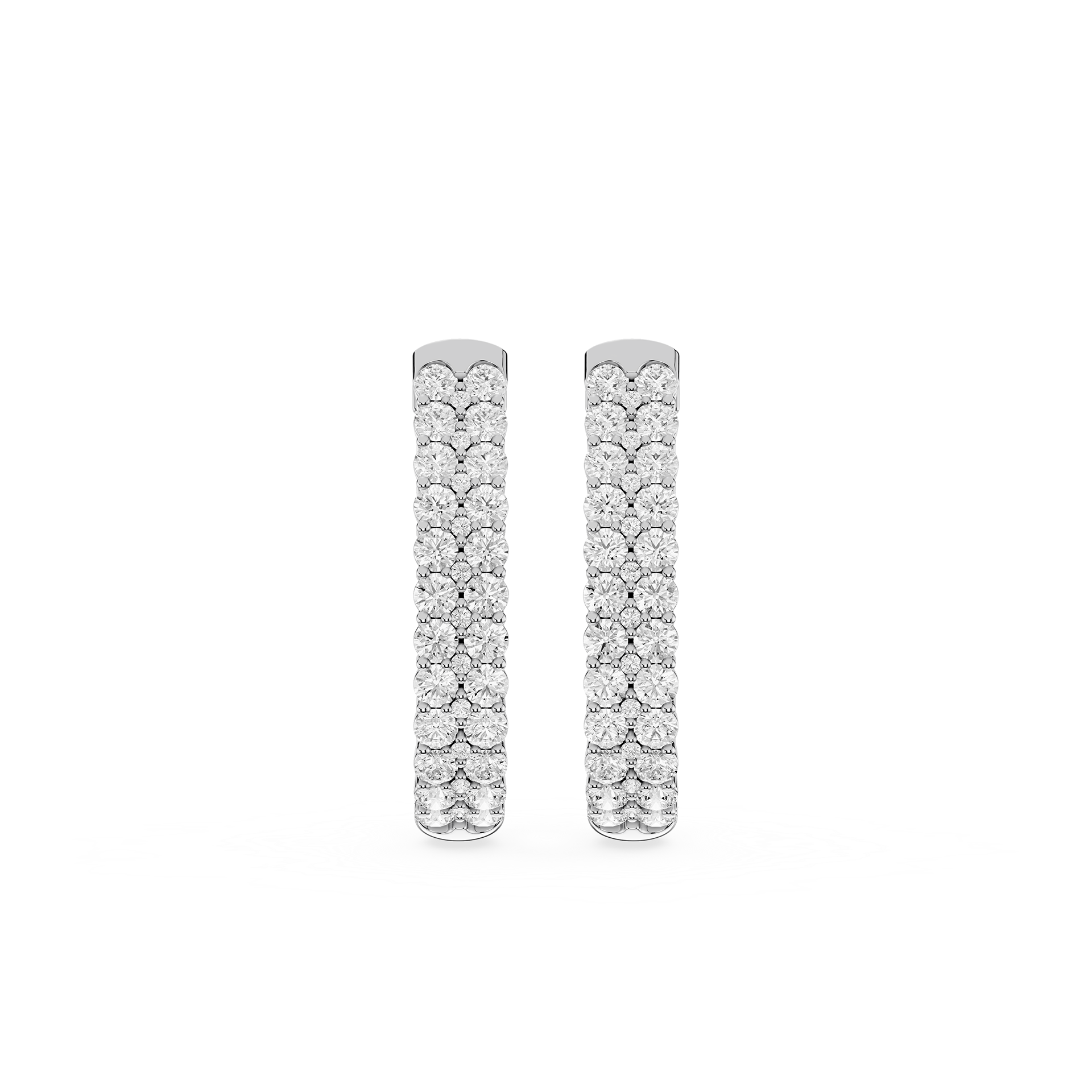 Pair of diamond earrings on a white background