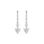 Pair of diamond earrings on a white background