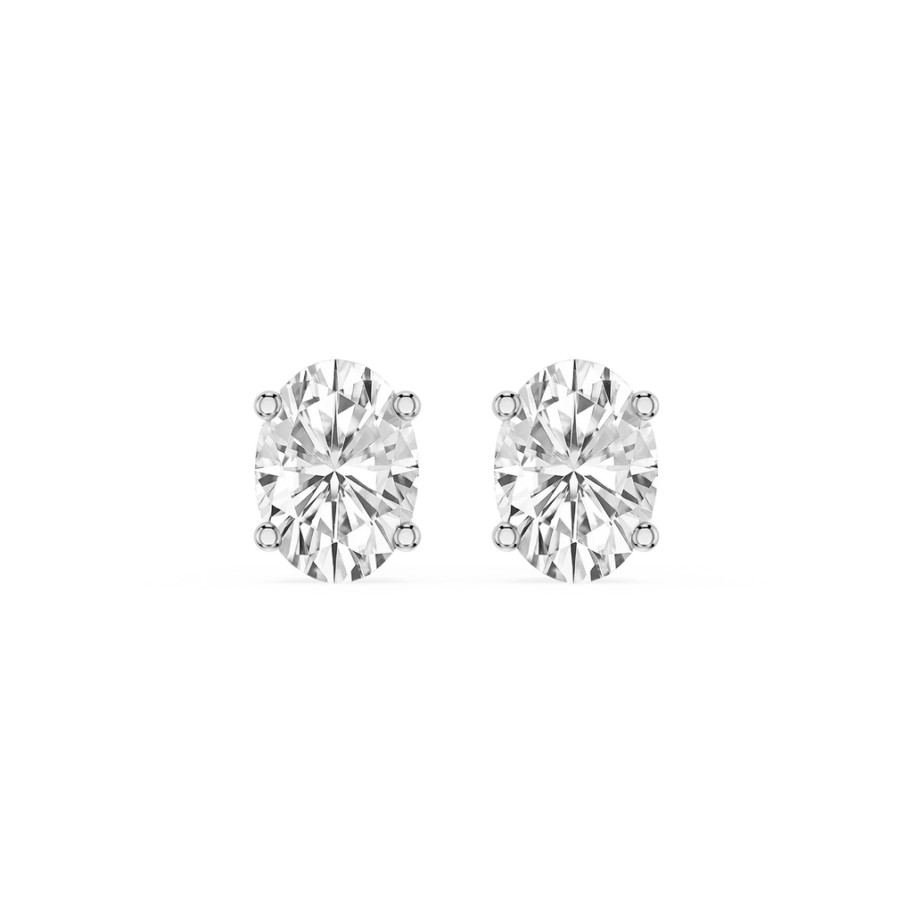 Pair of diamond stud earrings on a white background