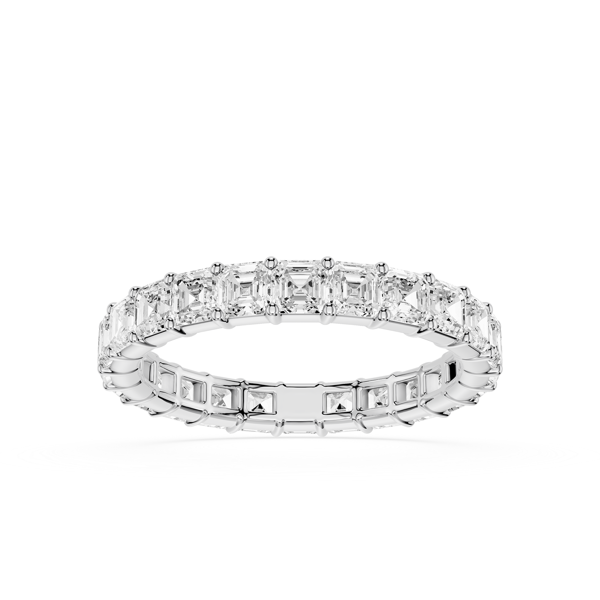 A Silver gold eternity ring featuring a continuous row of baguette-cut clear diamonds on the top and smaller round diamonds on the sides, set against a plain white background.