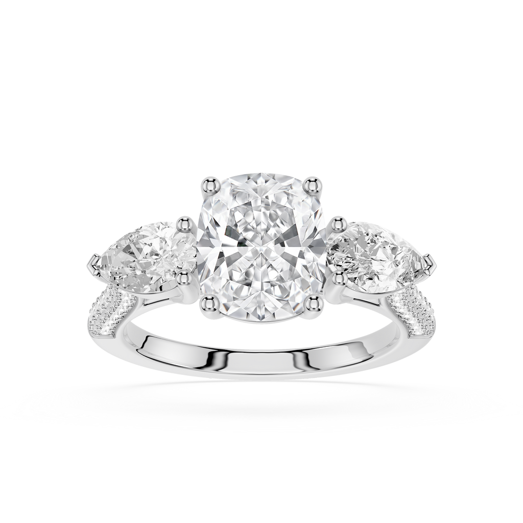 Diamond ring with three clear gemstones on a white background
