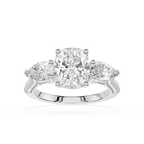 Diamond ring with three clear gemstones on a white background