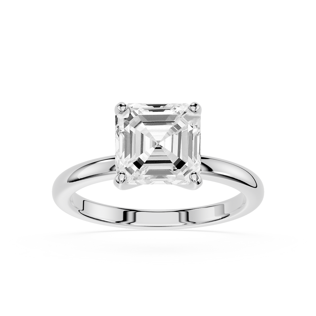 Diamond ring with emerald-cut diamond on a white background