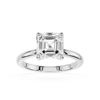 Diamond ring with emerald-cut diamond on a white background