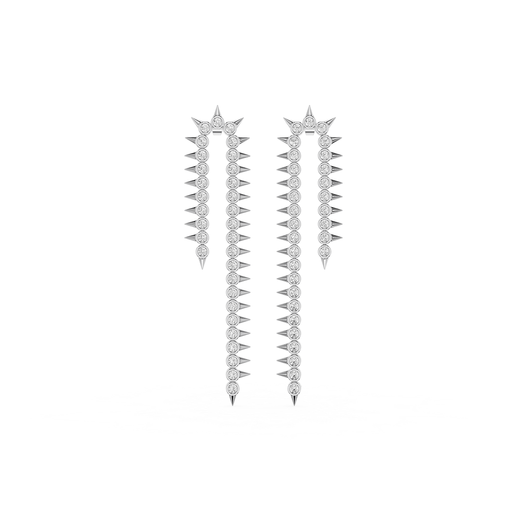 Pair of diamond spike earrings on a white background