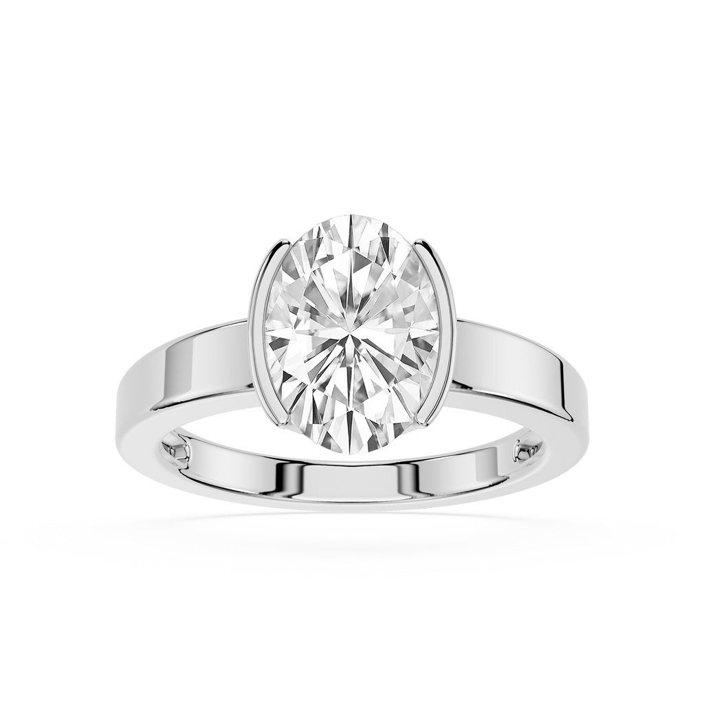 Silver ring with a large diamond on a white background