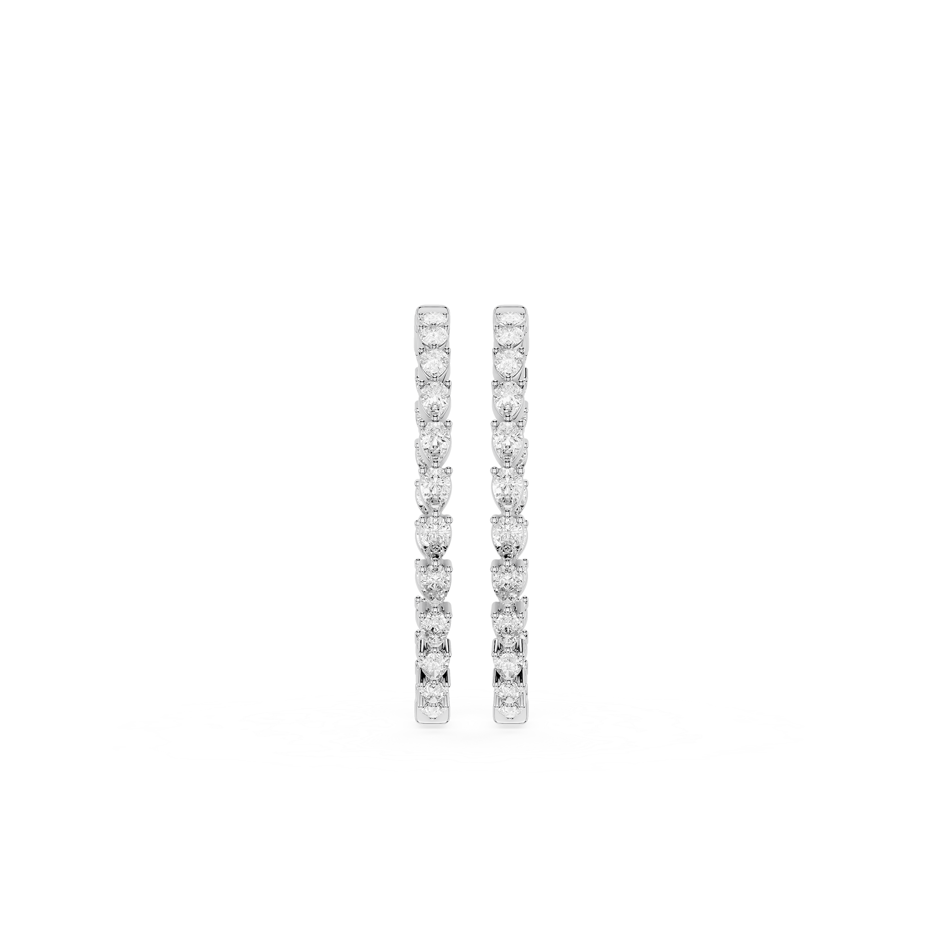 Pair of diamond earrings on a white background