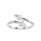 A Silver gold ring featuring two triangular-cut clear gemstones in a split-band design, set against a plain white background.