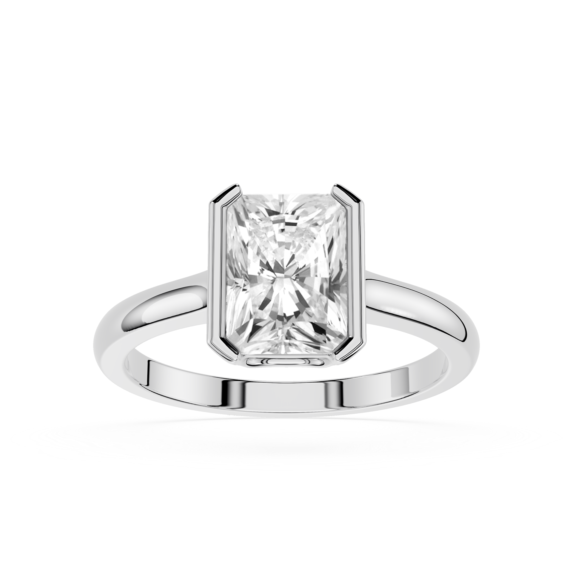 Diamond ring with a rectangular cut gemstone on a white background