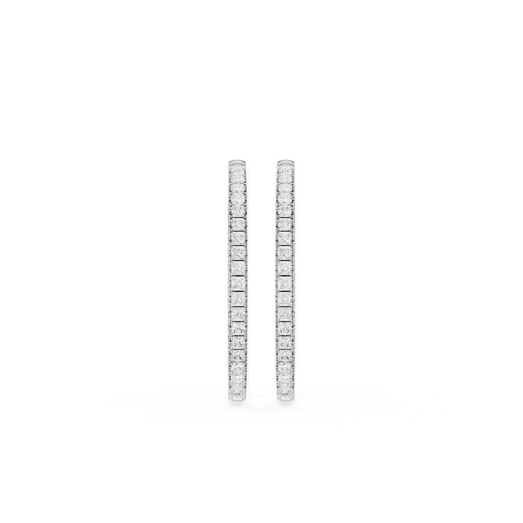 Pair of diamond hoop earrings on a white background