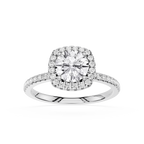 Diamond ring with a halo on a white background