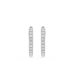 Pair of diamond hoop earrings on a white background