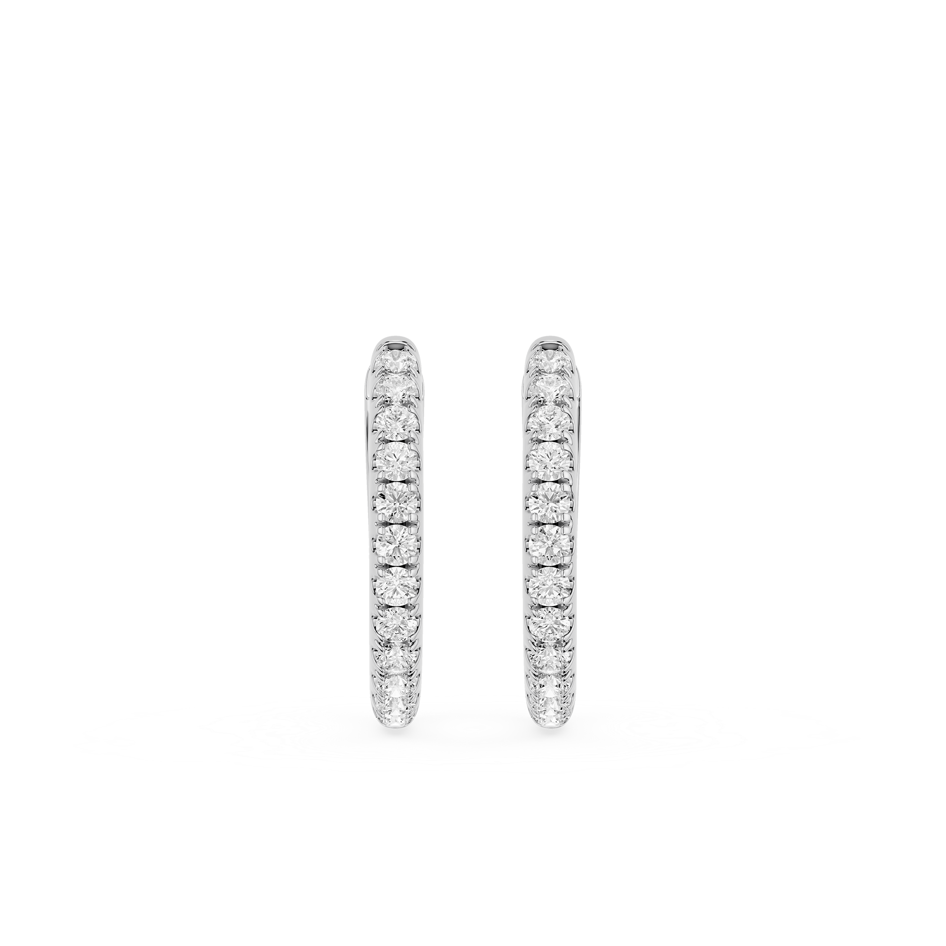 Pair of diamond hoop earrings on a white background