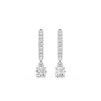 Pair of diamond earrings on a white background