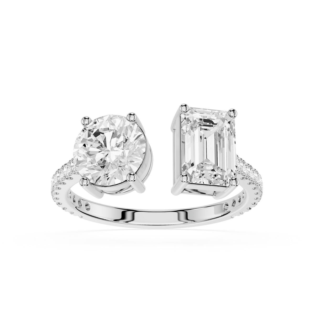 Round brilliant-cut and an emerald-cut white gold engagement ring in Toi et Moi style.