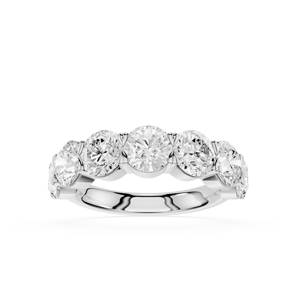 A five-stone diamond ring in a polished silver-colored metal band, set against a clean white background.