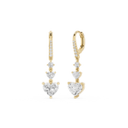 Gold earrings with heart-shaped diamond drops on a white background