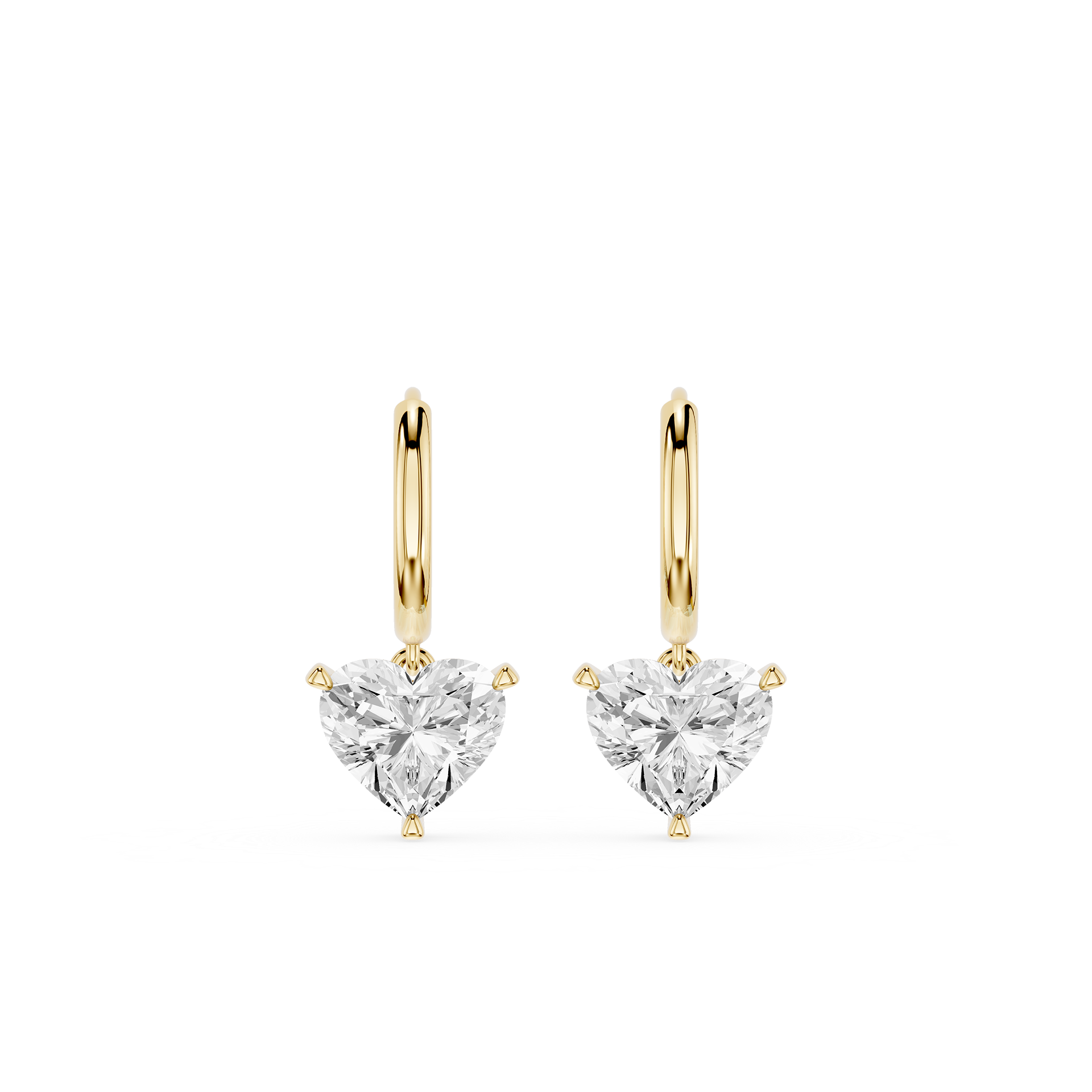 Gold hoop earrings with clear heart-shaped gemstones on a white background