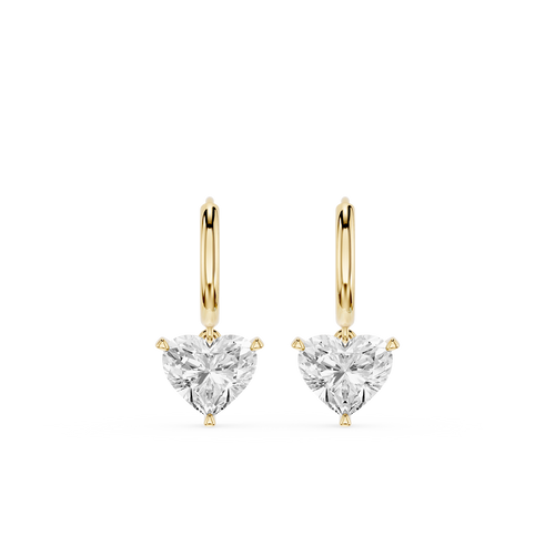 Gold hoop earrings with clear heart-shaped gemstones on a white background