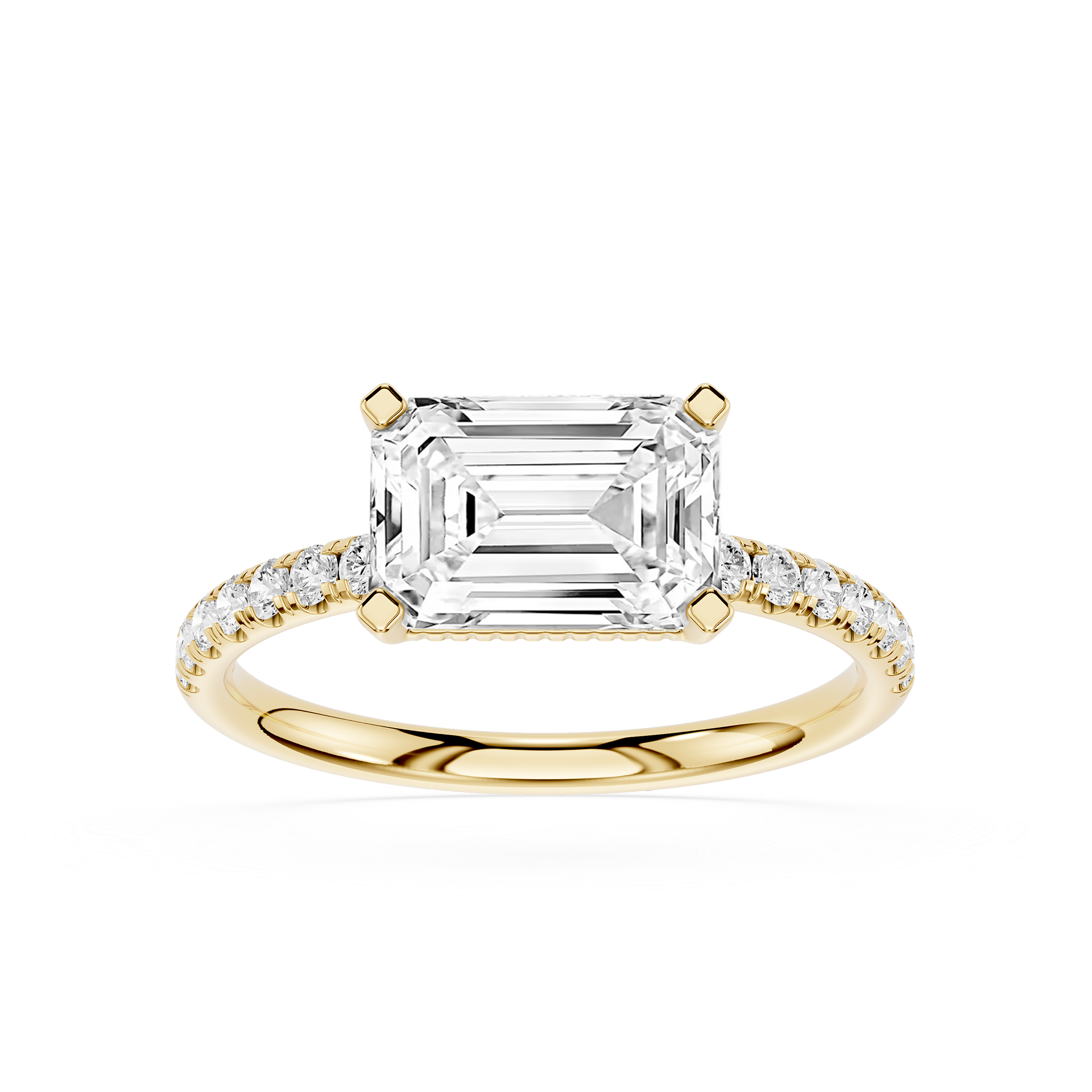 An emerald-cut diamond engagement ring in yellow gold with pavé-set diamonds on the band, shown on a clean white background.